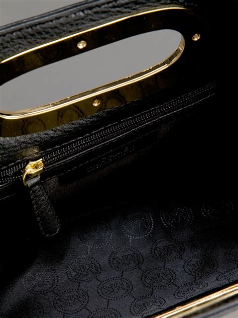 michael kors berkley clutch black|Michael Michael Kors Berkley Legacy Leather Clutch .